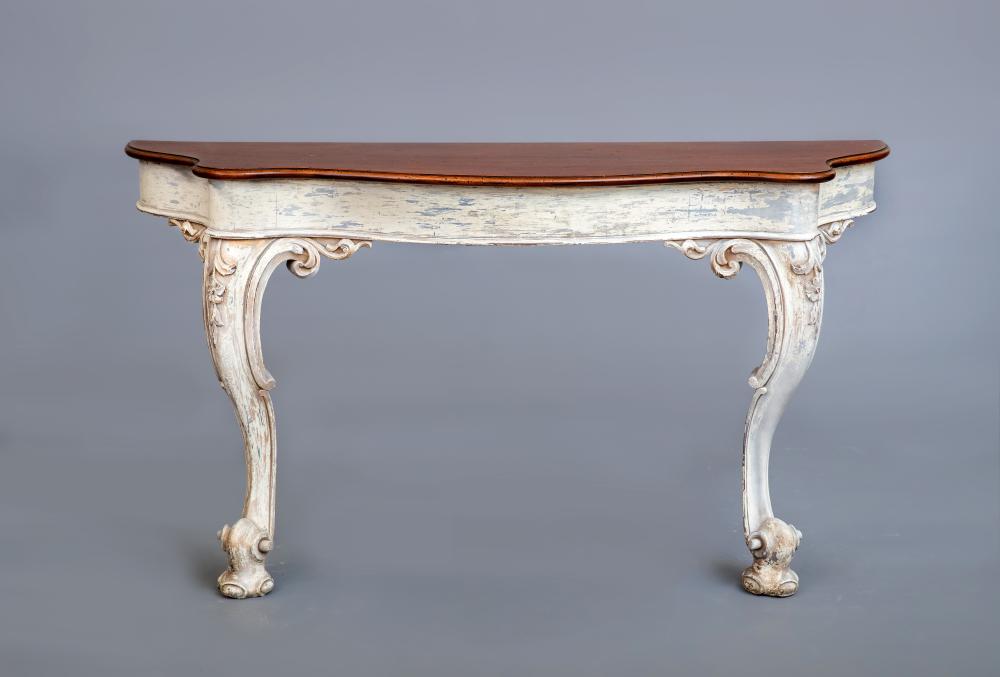A CARVED AND PAINTED MAHOGANY(?) CONSOLE TABLE Image