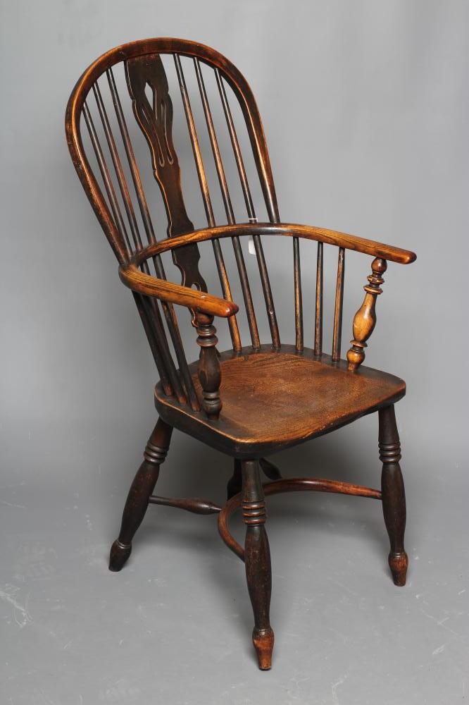 A WINDSOR SPINDLE BACK ARMCHAIR in ash and elm Image
