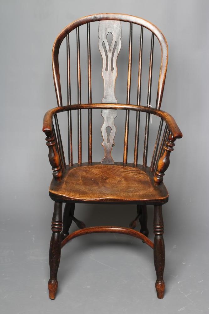 A WINDSOR SPINDLE BACK ARMCHAIR in ash and elm Image