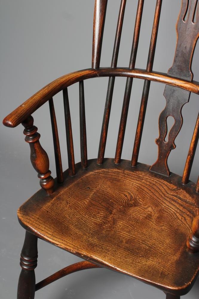 A WINDSOR SPINDLE BACK ARMCHAIR in ash and elm Image