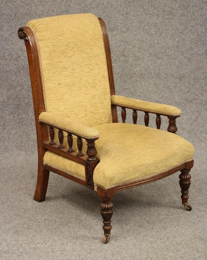 A GENTLEMAN'S VICTORIAN OAK FRAMED ARMCHAIR upholstered in gold chenille Image