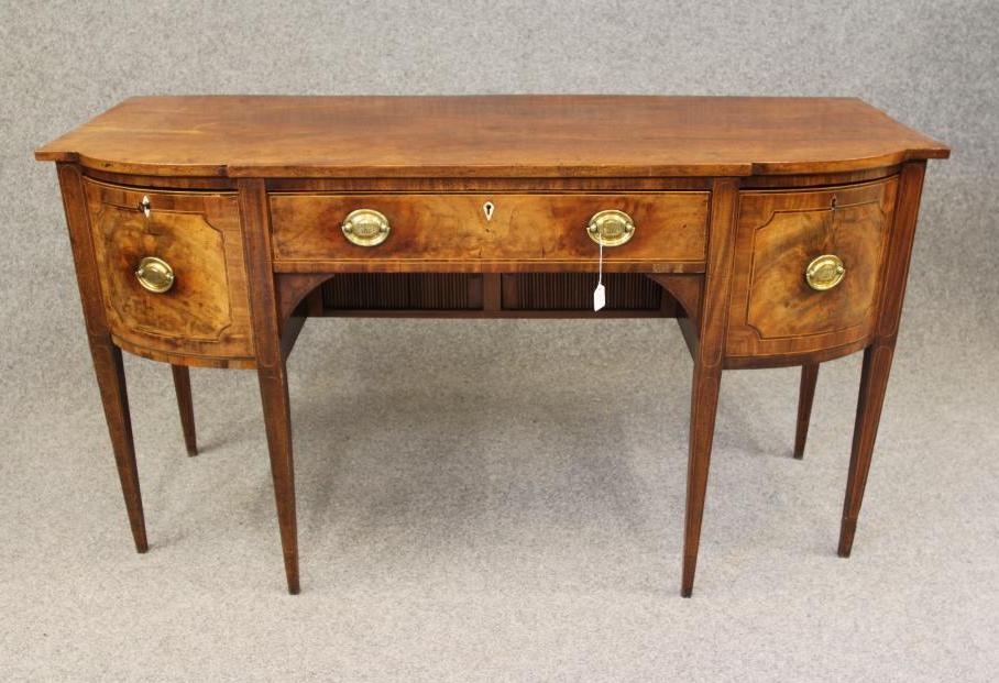 A GEORGIAN MAHOGANY SIDEBOARD Image