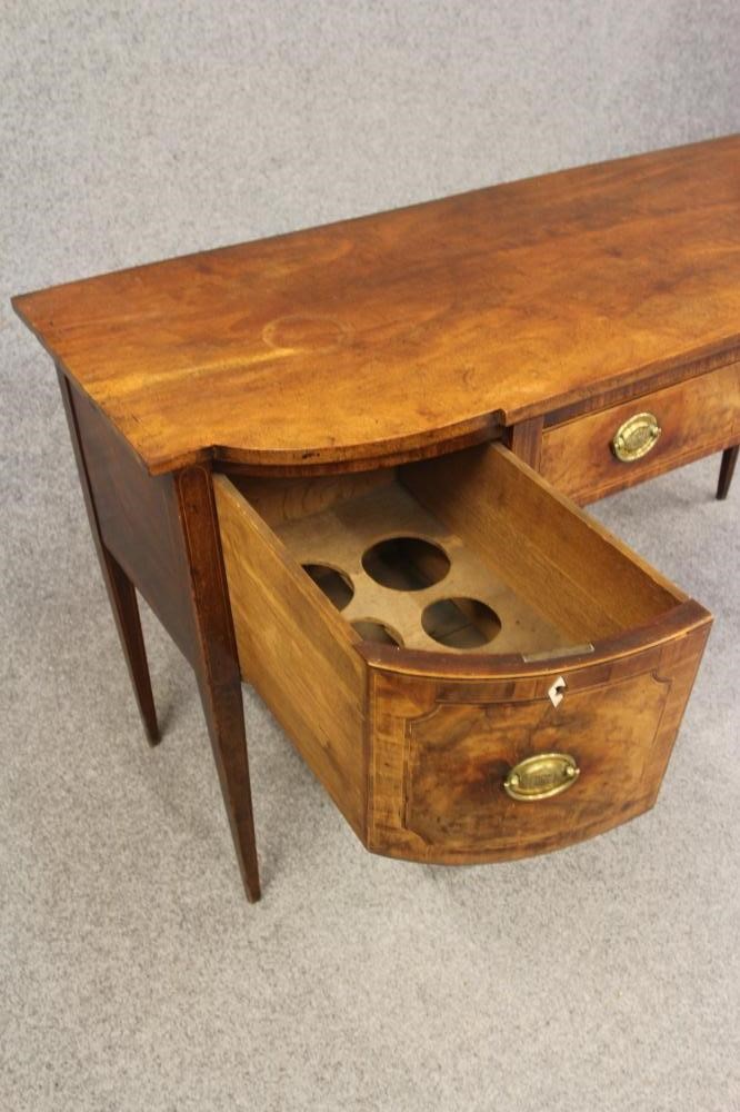 A GEORGIAN MAHOGANY SIDEBOARD Image