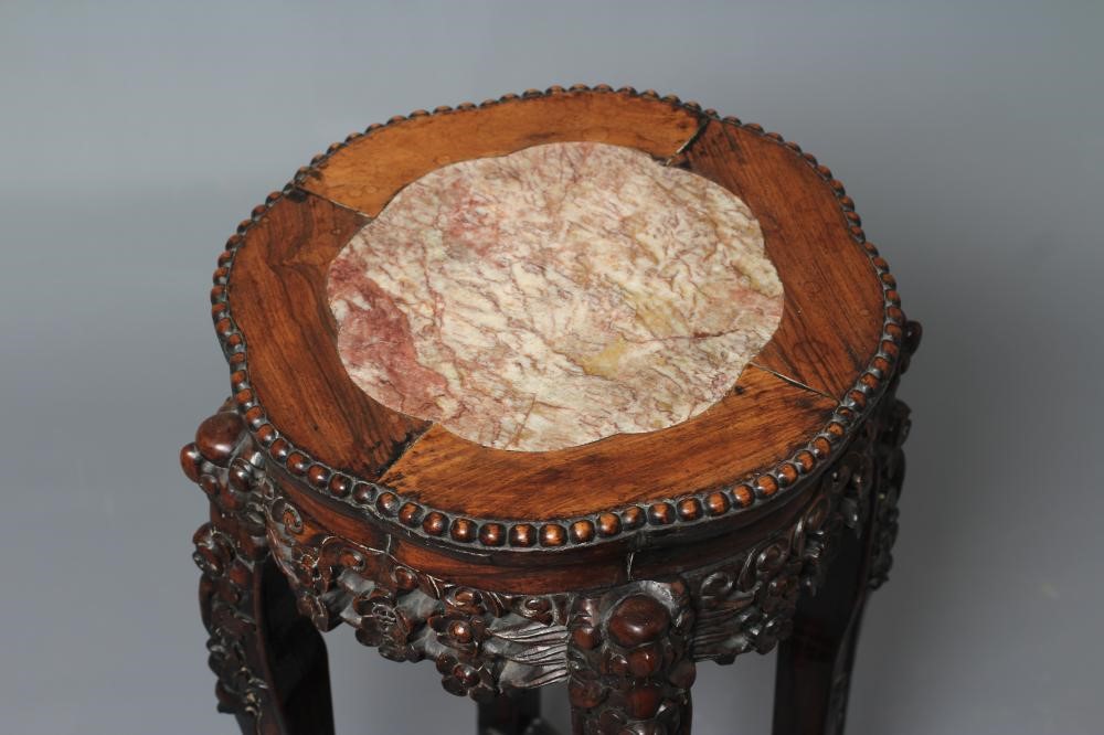 A CHINESE PADOUK WOOD JARDINIERE STAND Image