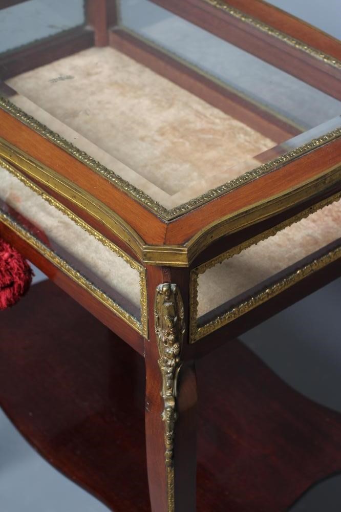 A VICTORIAN MAHOGANY AND GILT METAL MOUNTED BIJOUTERIE TABLE Image