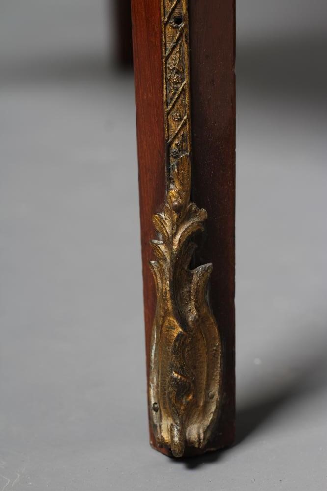 A VICTORIAN MAHOGANY AND GILT METAL MOUNTED BIJOUTERIE TABLE Image