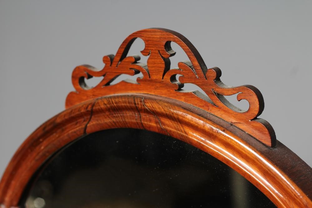 A VICTORIAN WALNUT MIRROR BACKED WHATNOT Image