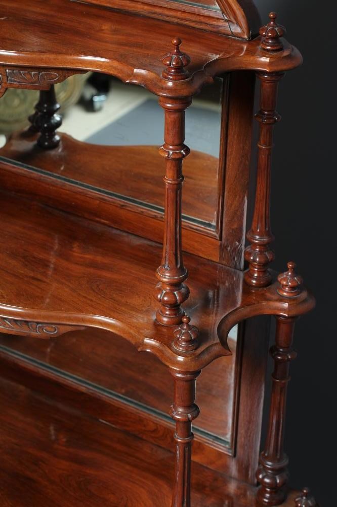 A VICTORIAN WALNUT MIRROR BACKED WHATNOT Image