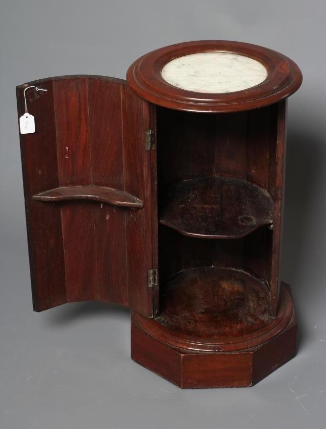 A VICTORIAN MAHOGANY CYLINDRICAL BEDSIDE CUPBOARD Image