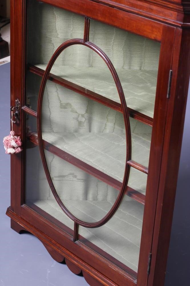 A GEORGIAN MAHOGANY GLAZED CORNER CUPBOARD Image