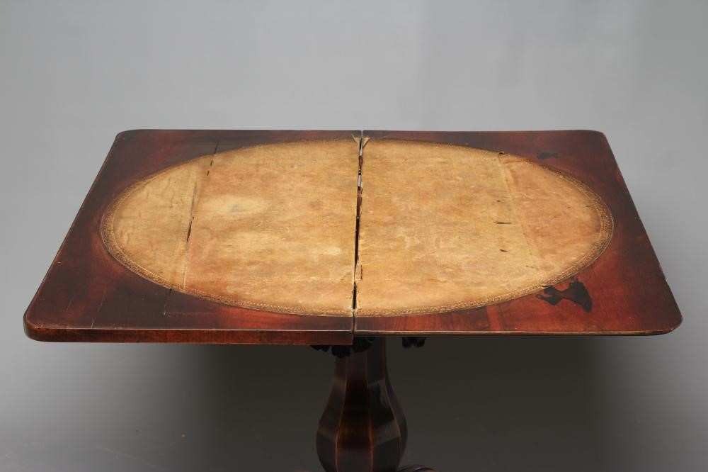 AN EARLY VICTORIAN ROSEWOOD FOLDING CARD TABLE of rounded oblong form Image