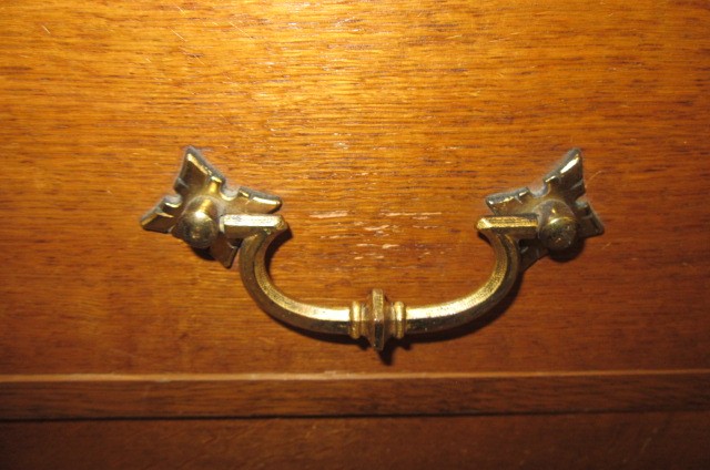 A GOTHIC REVIVAL LIGHT OAK AND BLACK STENCILLED WARDROBE Image