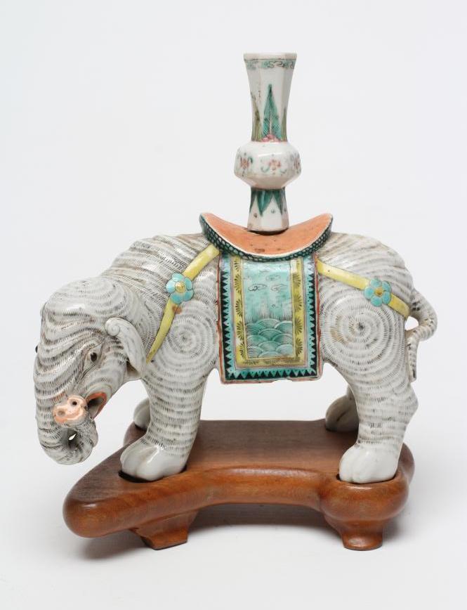 A CHINESE PORCELAIN JOSS STICK HOLDER/INCENSE BURNER modelled as an elephant with orange Image