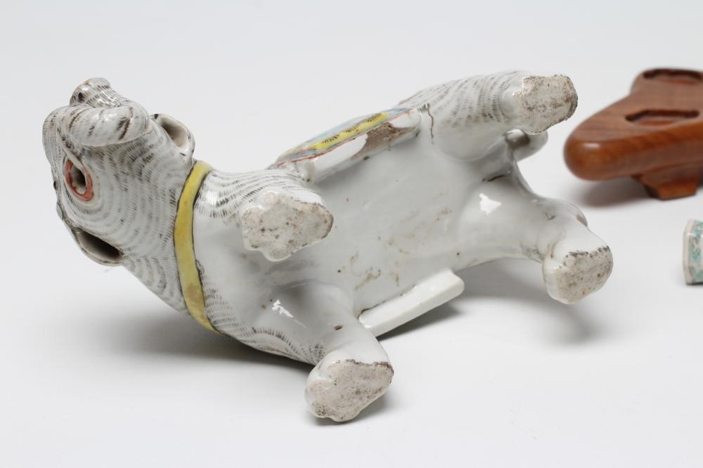 A CHINESE PORCELAIN JOSS STICK HOLDER/INCENSE BURNER modelled as an elephant with orange Image