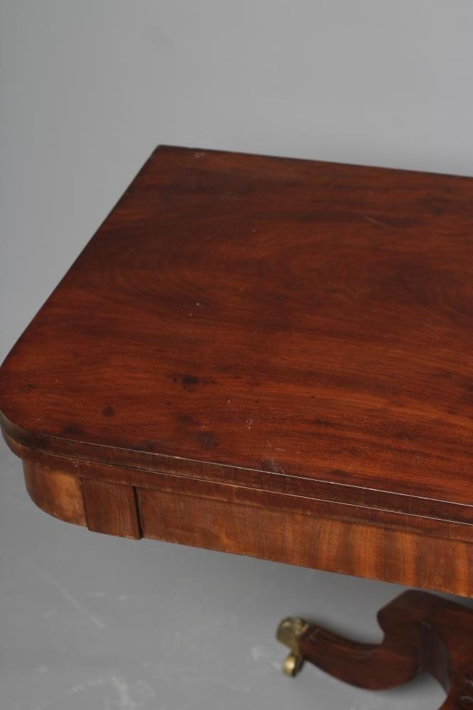 A GEORGIAN MAHOGANY FOLDING TEA TABLE Image