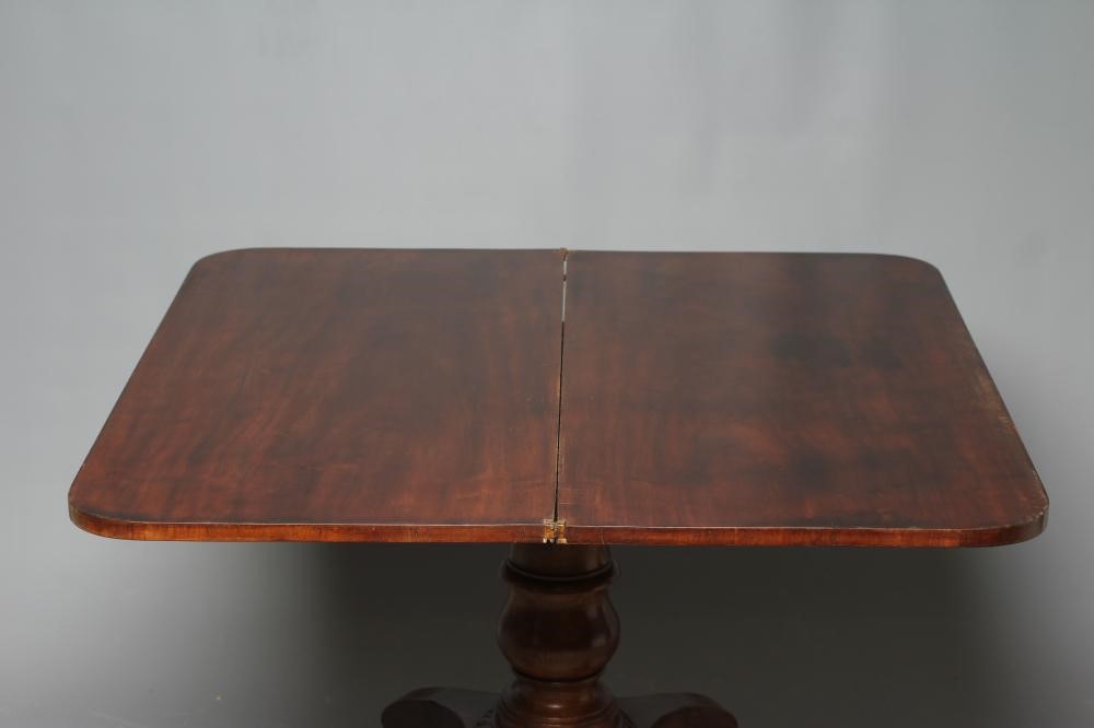 A GEORGIAN MAHOGANY FOLDING TEA TABLE Image