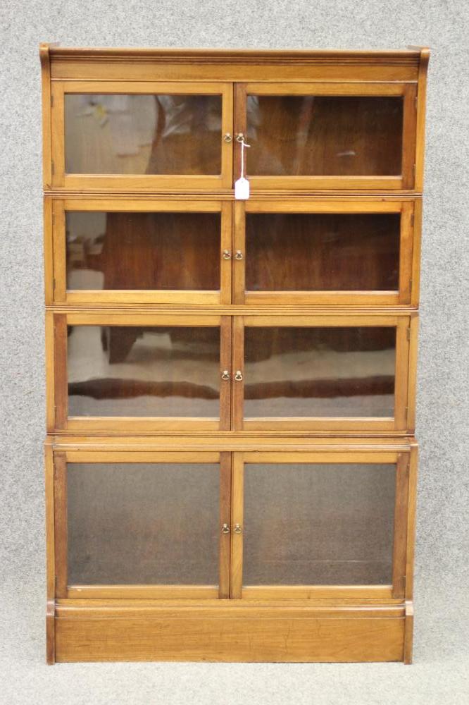 A MAHOGANY SECTIONAL BOOKCASE "The Oxford" by William Baker & Co. Ltd. Image