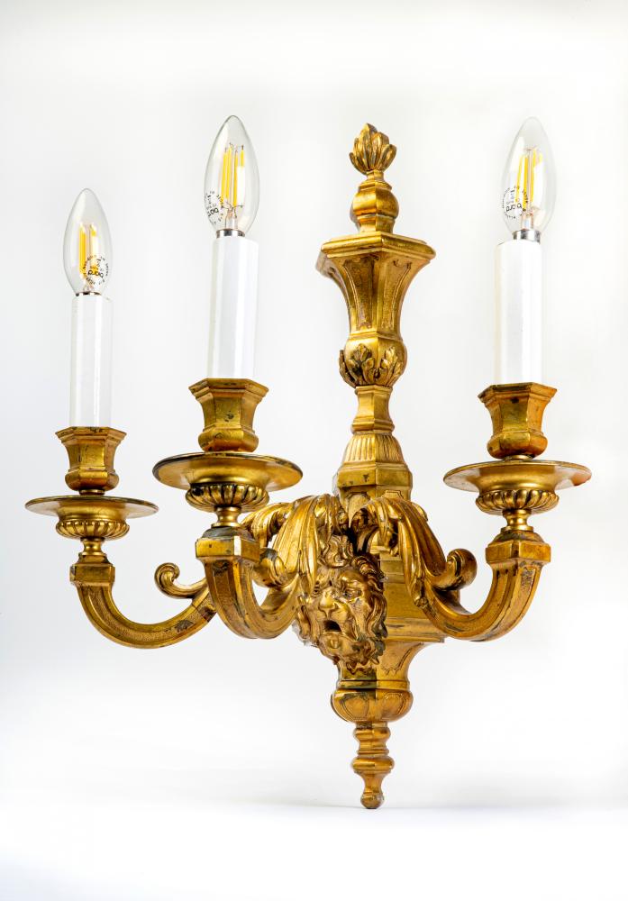 A SET OF FOUR LOUIS XIV STYLE GILT METAL THREE BRANCH WALL LIGHTS Image