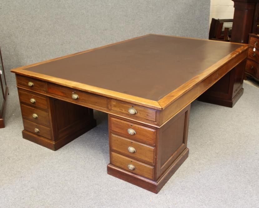 A LARGE MAHOGANY LIBRARY DESK Image