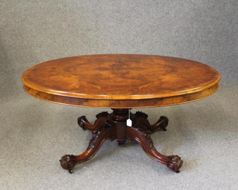 A VICTORIAN WALNUT LOO TABLE Image