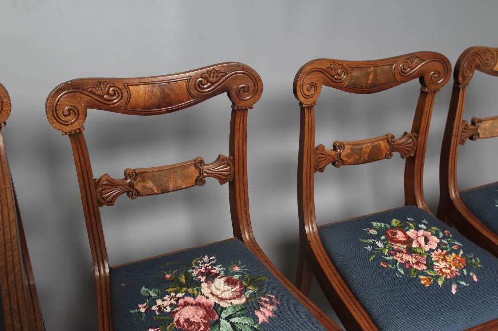 A SET OF SIX REGENCY MAHOGANY DINING CHAIRS including an elbow chair Image