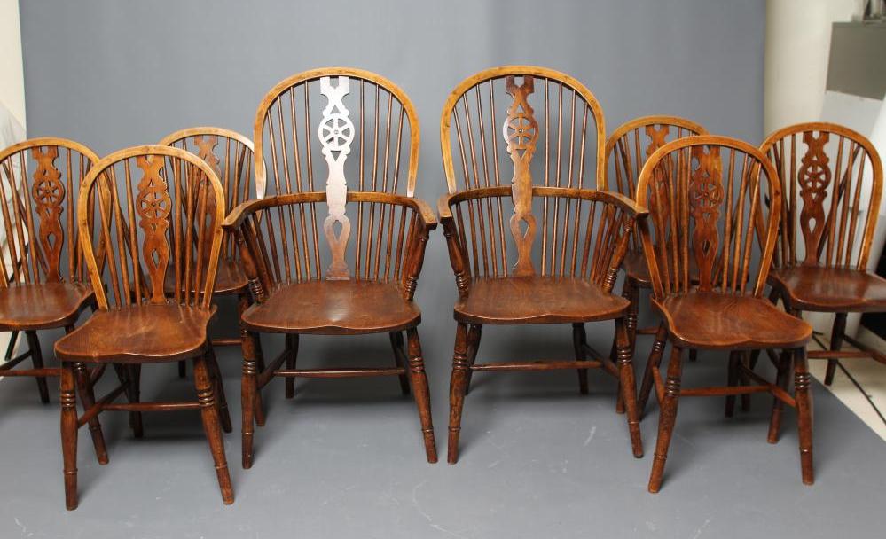 A SET OF SIX WHEELBACK WINDSOR CHAIRS Image