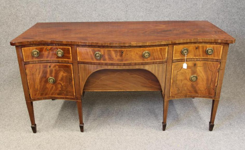 A GEORGIAN MAHOGANY SIDEBOARD Image