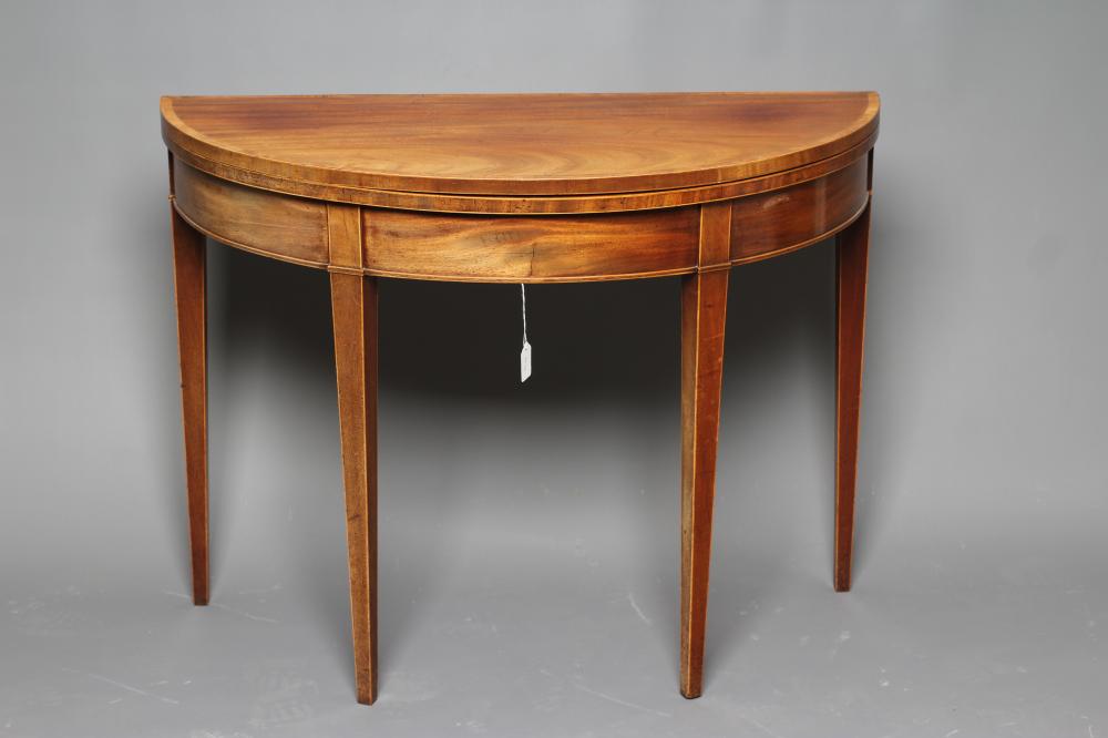 A GEORGIAN MAHOGANY FOLDING TEA TABLE Image