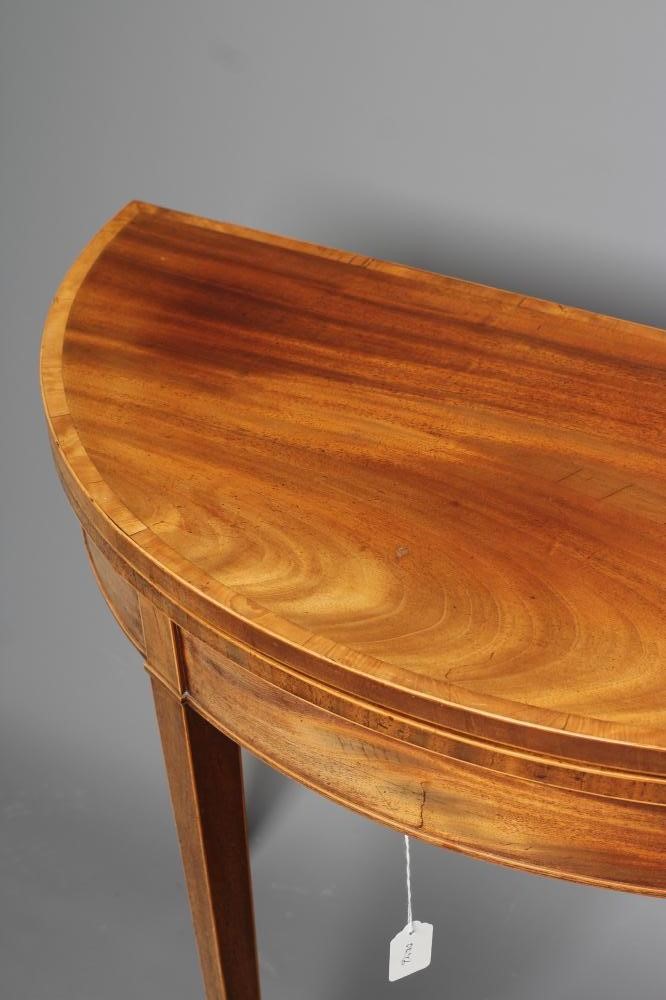 A GEORGIAN MAHOGANY FOLDING TEA TABLE Image