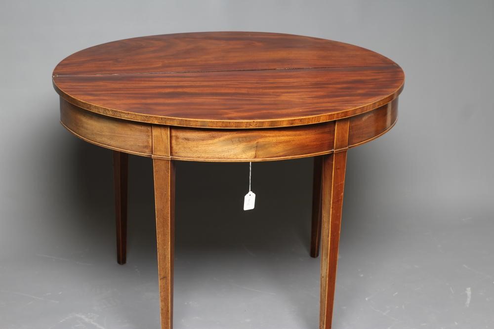 A GEORGIAN MAHOGANY FOLDING TEA TABLE Image