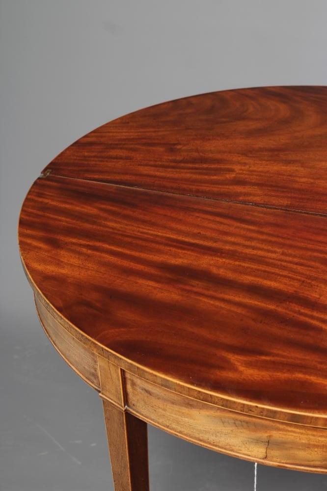 A GEORGIAN MAHOGANY FOLDING TEA TABLE Image