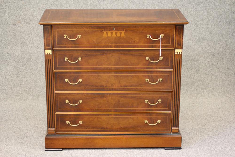 A WALNUT AND EBONISED SECRETAIRE CHEST Image