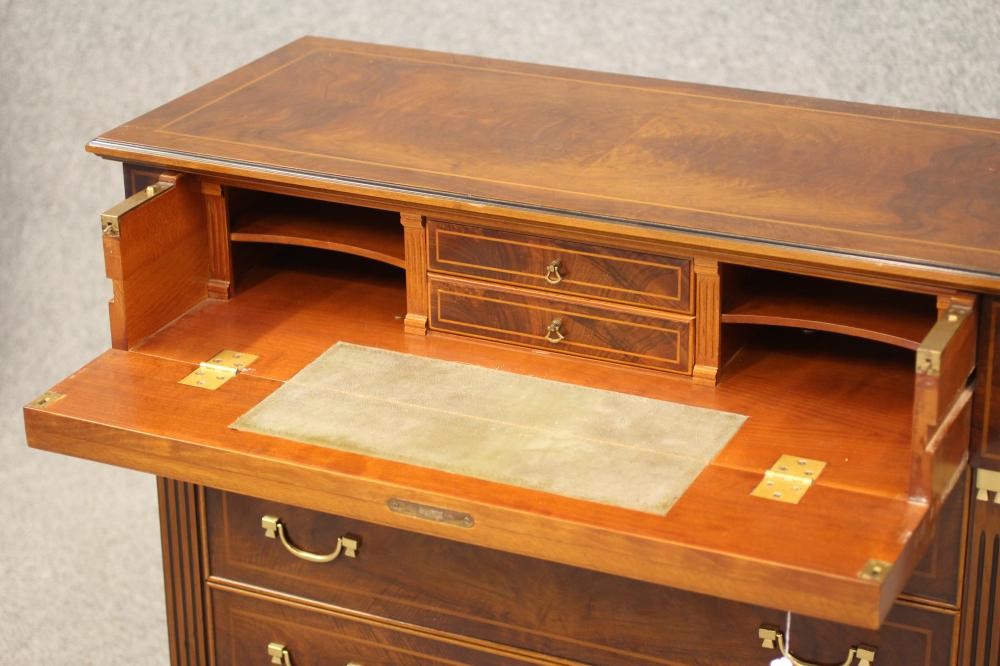 A WALNUT AND EBONISED SECRETAIRE CHEST Image