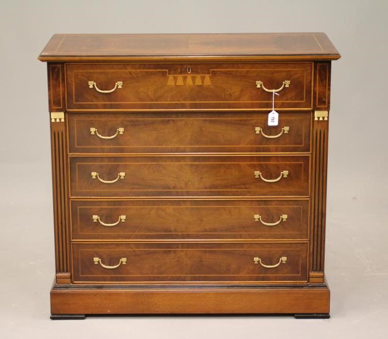 A WALNUT AND EBONISED SECRETAIRE CHEST Image