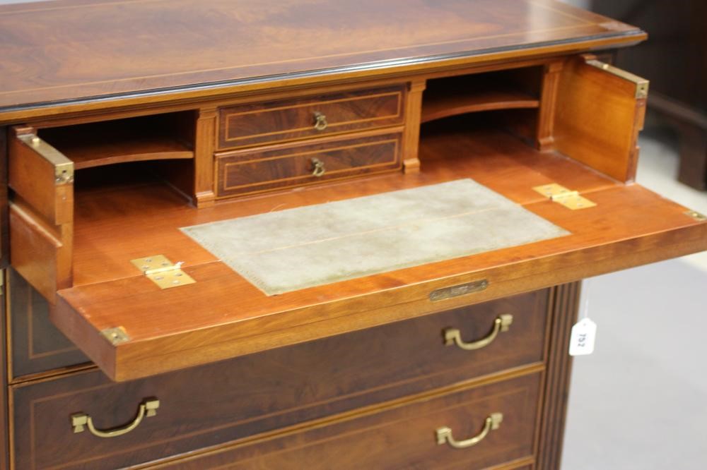 A WALNUT AND EBONISED SECRETAIRE CHEST Image