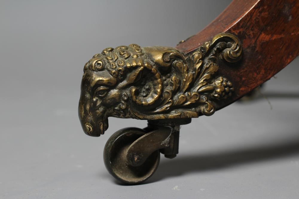 A REGENCY ROSEWOOD FOLDING TEA TABLE of rounded oblong form Image