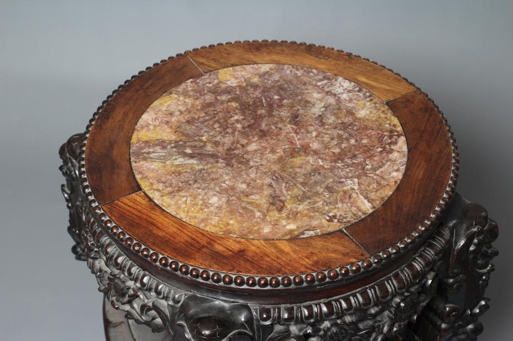 A CHINESE HARD WOOD JARDINIERE STAND Image