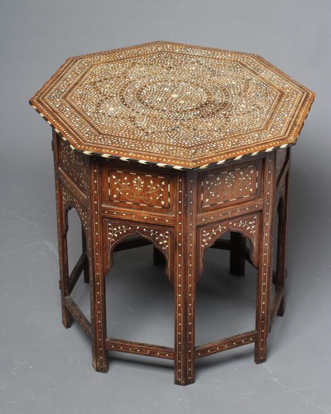 AN INDIAN HARDWOOD OCCASIONAL TABLE Image