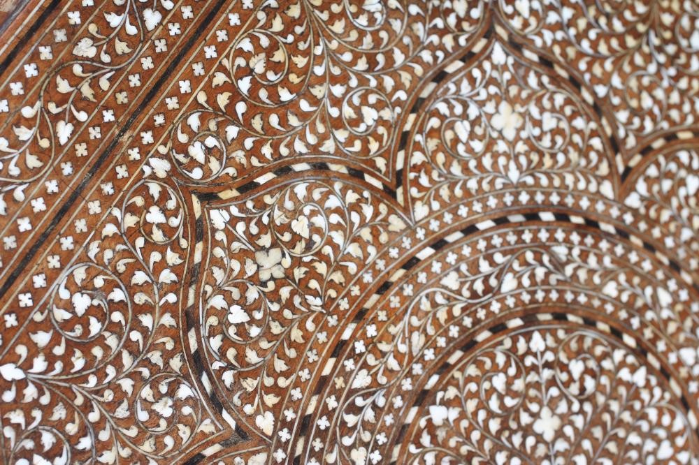 AN INDIAN HARDWOOD OCCASIONAL TABLE Image