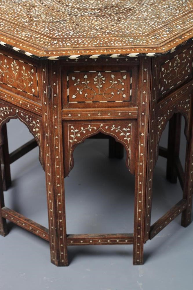 AN INDIAN HARDWOOD OCCASIONAL TABLE Image