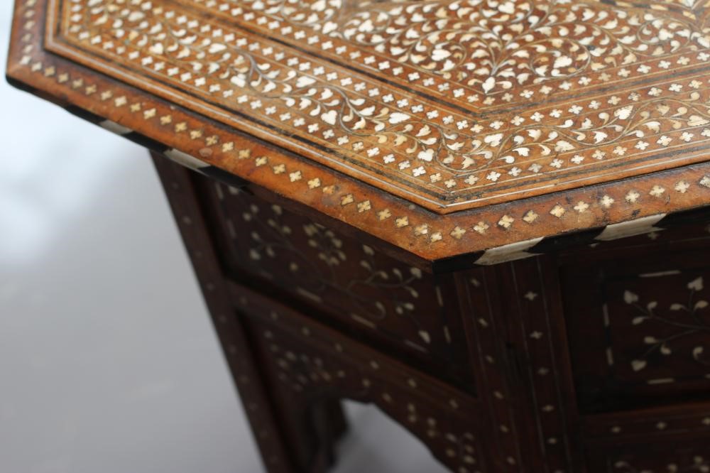 AN INDIAN HARDWOOD OCCASIONAL TABLE Image