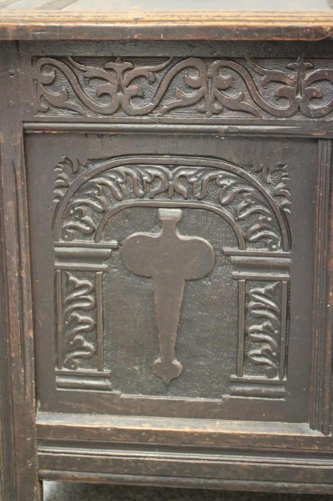 AN OAK PANELLED COFFER Image