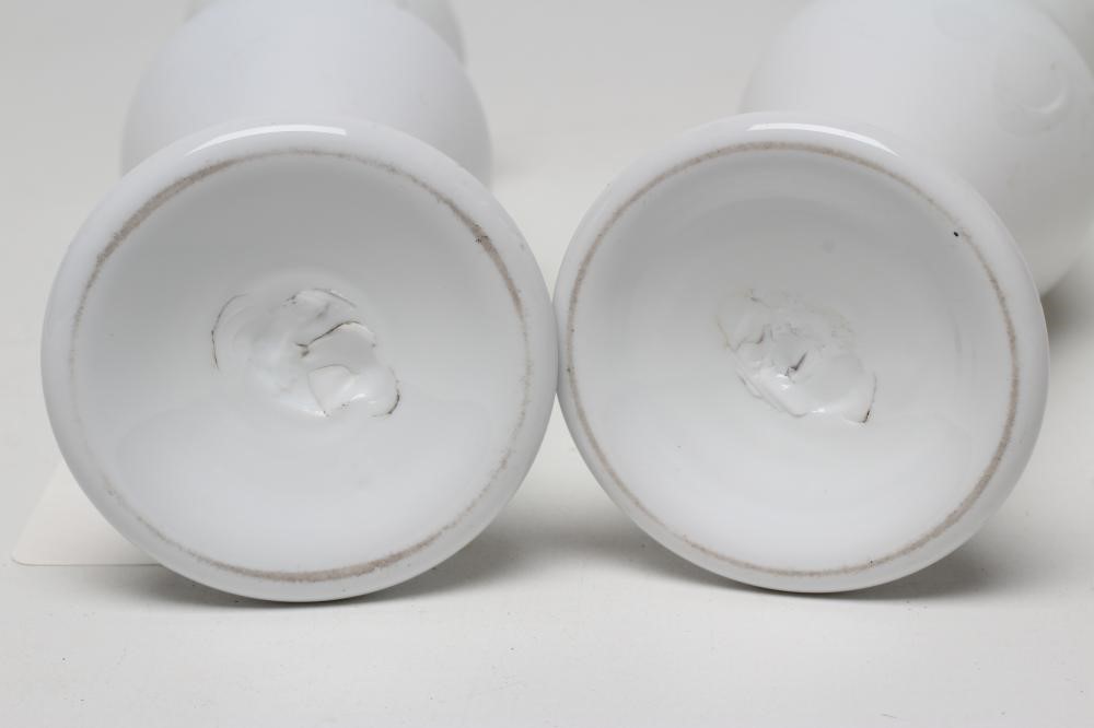 A PAIR OF SOUTH STAFFORDSHIRE OPAQUE WHITE VASES Image