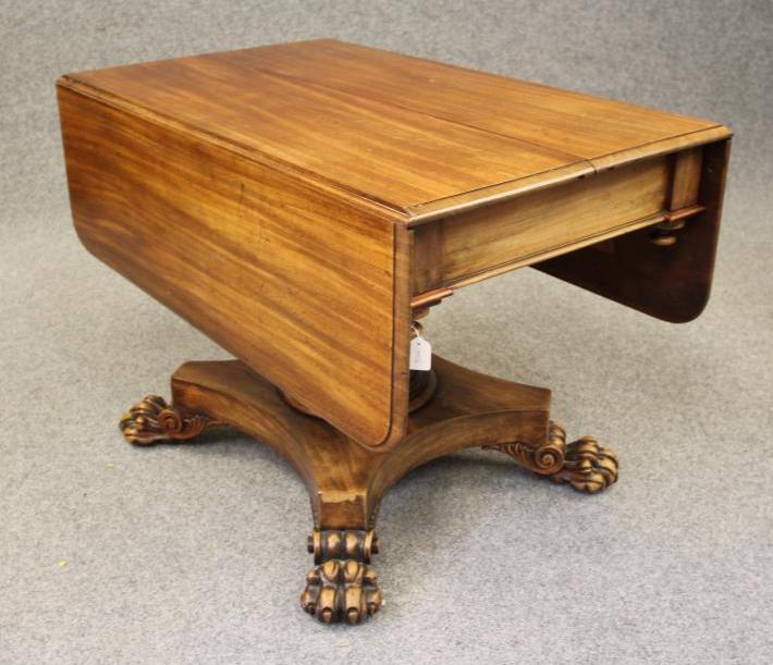 A MAHOGANY BREAKFAST TABLE Image