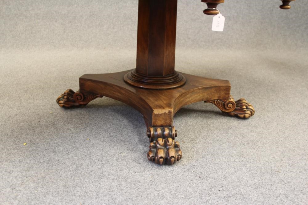 A MAHOGANY BREAKFAST TABLE Image