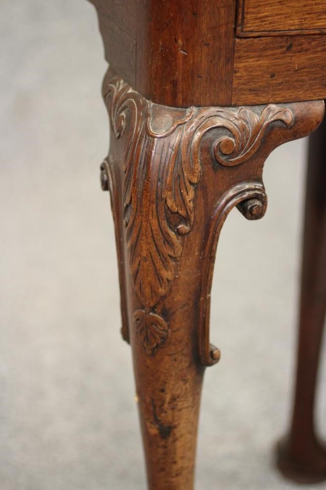 A GEORGIAN MAHOGANY FOLDING TEA TABLE Image