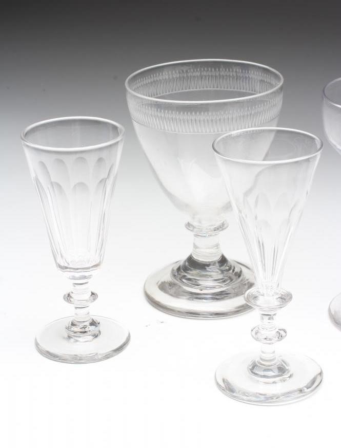 FOUR GEORGIAN RUMMERS including a heavy panel and slice cut rummer on stepped canted square foot Image