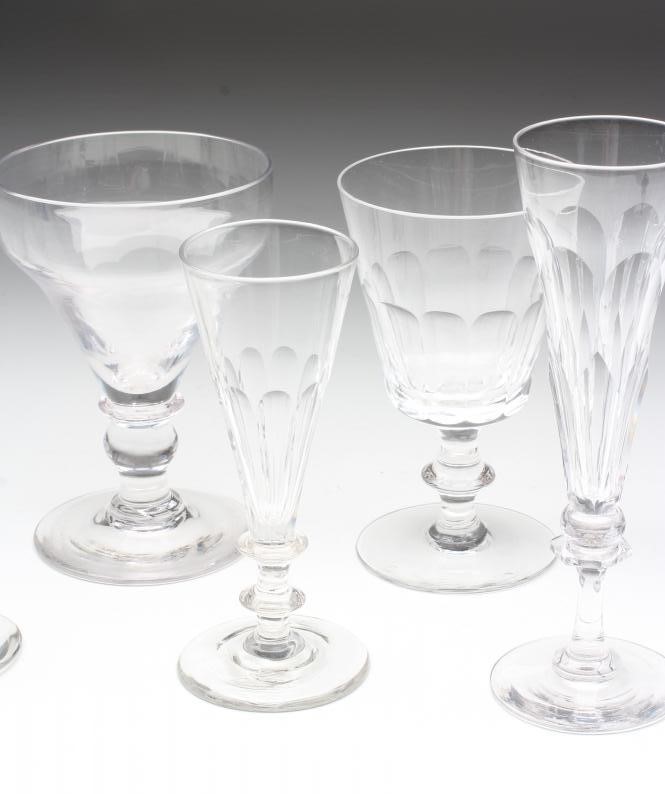 FOUR GEORGIAN RUMMERS including a heavy panel and slice cut rummer on stepped canted square foot Image