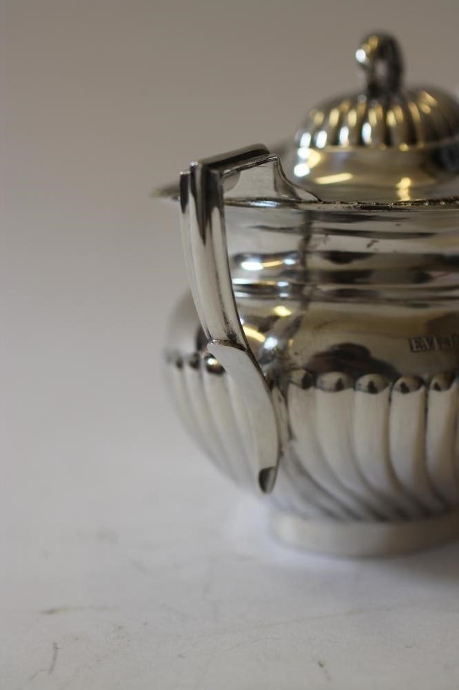 A SILVER TWO HANDLED SUCRIER AND COVER Image