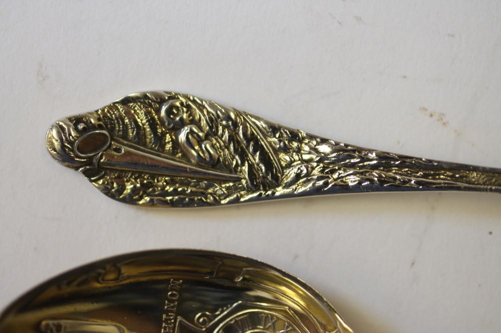 A PAIR OF GILDED SILVER  "BIRTH RECORD" SPOONS Image